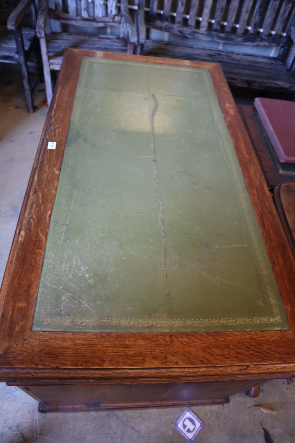 An early 20th century oak pedestal desk, width 136cm